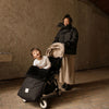 Schaffell Kinderwagen Fusssack "Noir" - für fixierte Gurte