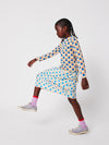 Kurze Socken „Tic Tac Toe“ von Bobo Choses in Lila mit roten & grünen Kontrasten.